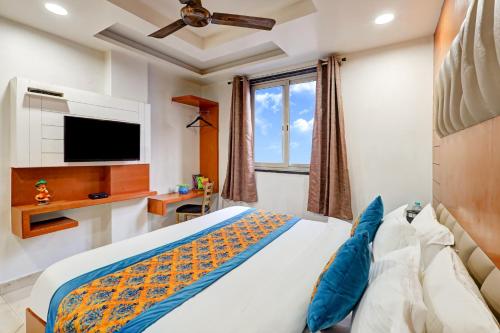 Hotel Tashkent Palace - Near New Delhi Railway Stationにあるベッド