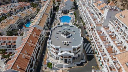 an overhead view of a city street with buildings at Ona Hollywood Mirage in Los Cristianos