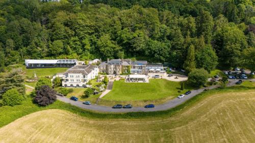 an aerial view of a large estate with cars parked at New House Country Hotel in Cardiff