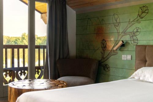 Cama o camas de una habitación en L'Arborescence