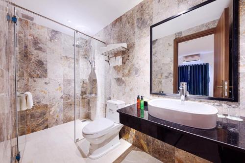 Koupelna v ubytování Essenza Hotel Đà Nẵng