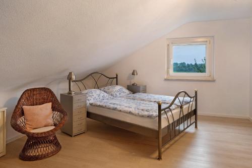 Katil atau katil-katil dalam bilik di Ferienhaus Engelsberghof