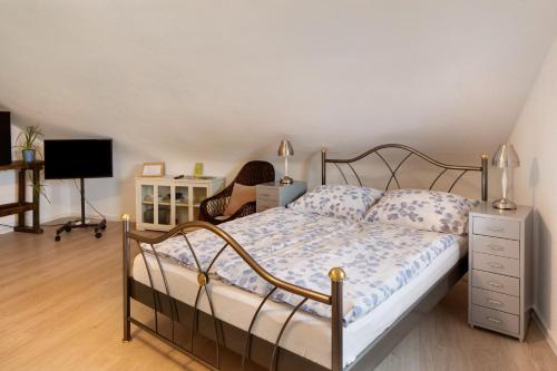 Katil atau katil-katil dalam bilik di Ferienhaus Engelsberghof