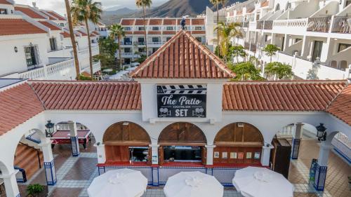 an overhead view of a building with a restaurant at Ona Beverly Hills Heights in Los Cristianos