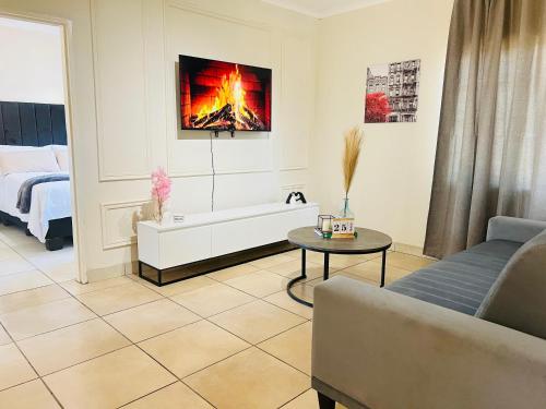 Postel nebo postele na pokoji v ubytování Modern Apartment in Randburg