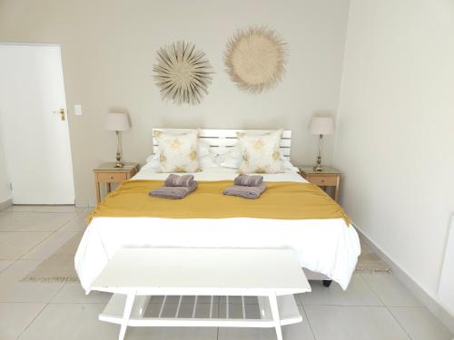 Postel nebo postele na pokoji v ubytování Stannards Guest Lodge 4 Star B&B, Knysna