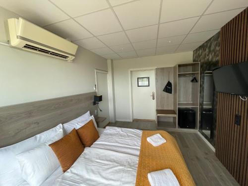 Ένα ή περισσότερα κρεβάτια σε δωμάτιο στο Dream - Luxury Hostel