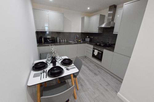 Η κουζίνα ή μικρή κουζίνα στο Luxe Apartment - Leicester City Centre