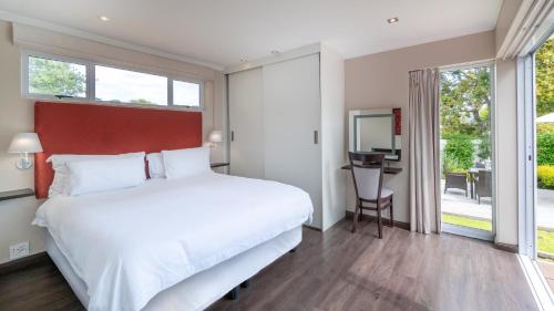 Postel nebo postele na pokoji v ubytování Nova Constantia Boutique Residence