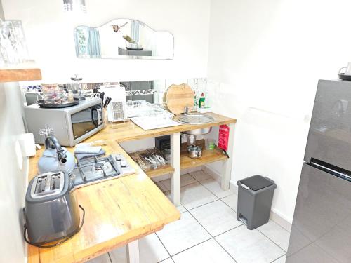 Kuchyň nebo kuchyňský kout v ubytování Stannards Guest Lodge 4 Star B&B, Knysna
