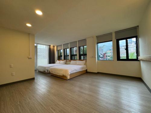 Postel nebo postele na pokoji v ubytování 慢且洄瀾文旅 Bantshiann Hualie Hotel