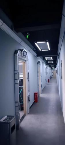 an empty hallway in a building with a door and a hallwayngth at 蚂蚁电竞馆武生院店 in Yangluo