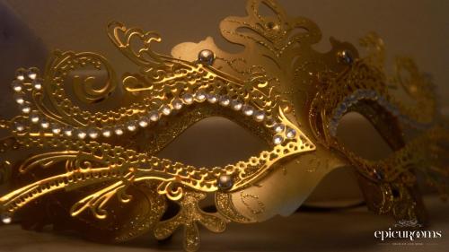 a gold masquerade mask with lights on it at Plgfe - Maison d'hôtes EPICUROOMS - Suites romantiques 5 étoiles in Gallargues-Le-Montueux