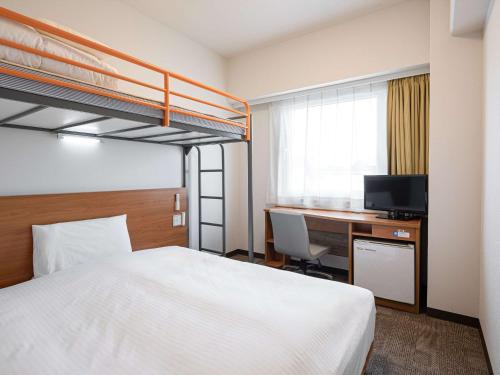 Postel nebo postele na pokoji v ubytování Comfort Inn Hitachinaka
