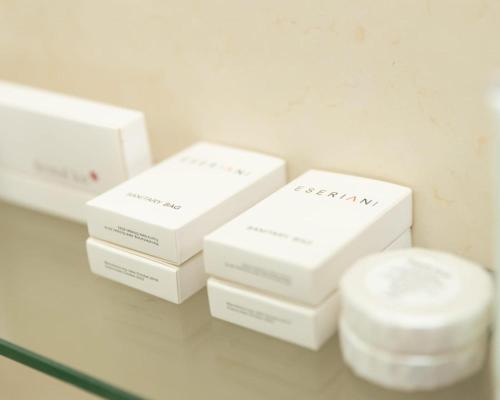 a group of white boxes sitting on a table at Eseriani The Hotel in Naivasha