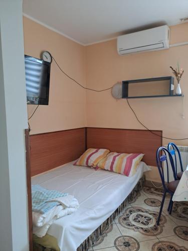 Ένα ή περισσότερα κρεβάτια σε δωμάτιο στο Pokoje goscinne zaglobianka