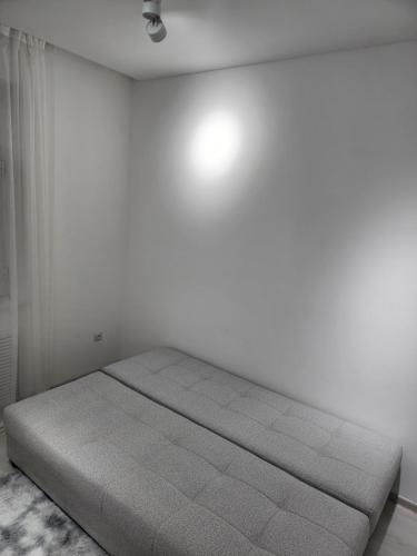 Postel nebo postele na pokoji v ubytování Orchidea loft