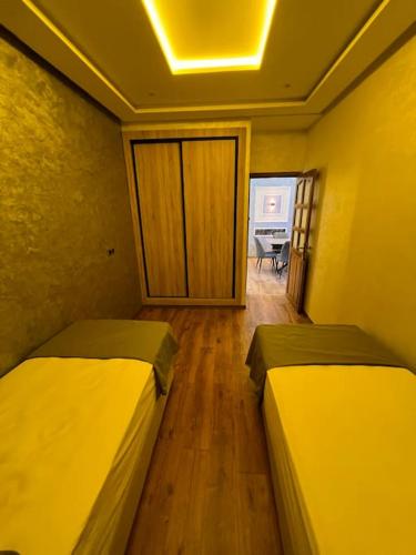 Postel nebo postele na pokoji v ubytování Appartement Fes Sami Haut Standing