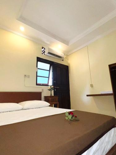 Zigiz Lovina Hostelにあるベッド