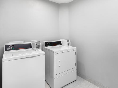two machines sitting next to each other in a room at Spark by Hilton Augusta in Augusta