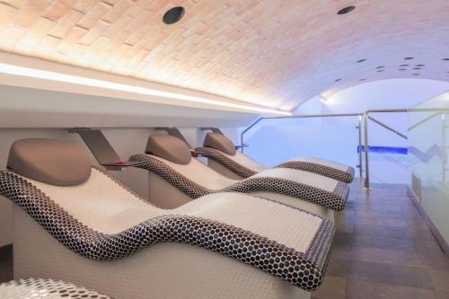 a group of chairs sitting on a bus at MYR Plaza Mercado & Spa in Valencia