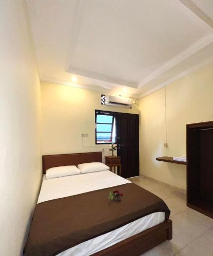 Zigiz Lovina Hostelにあるベッド