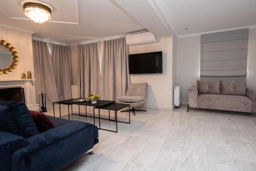 TV a/nebo společenská místnost v ubytování Mets Suites