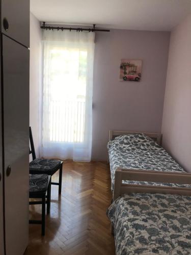 Postel nebo postele na pokoji v ubytování Apartment Mila