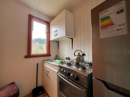 Kuchyň nebo kuchyňský kout v ubytování Oceana Suites Licanray