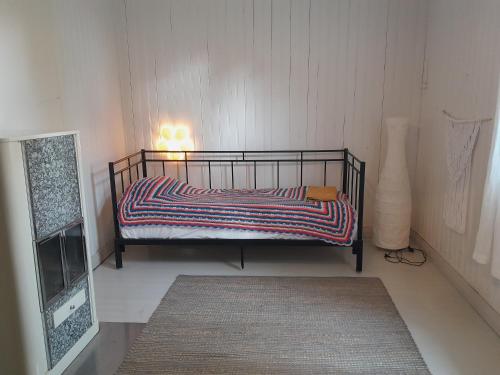 Postel nebo postele na pokoji v ubytování Riverside cottage