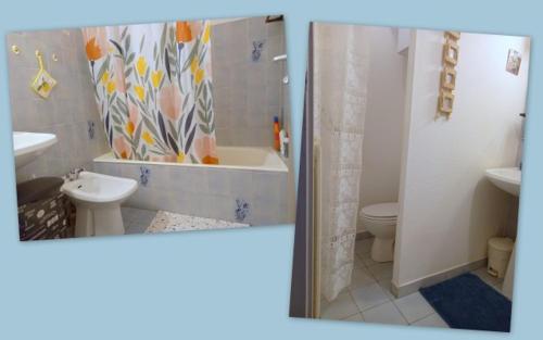 a bathroom with a tub and a sink and a toilet at t1 bis vue imprenable in Ajaccio