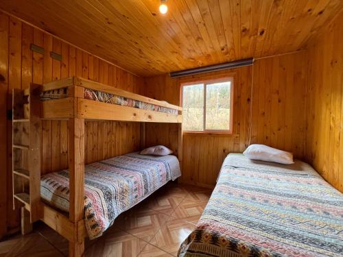 Postel nebo postele na pokoji v ubytování Oceana Suites Licanray