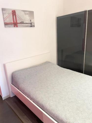 Ένα ή περισσότερα κρεβάτια σε δωμάτιο στο Appartement in Brussels Centre