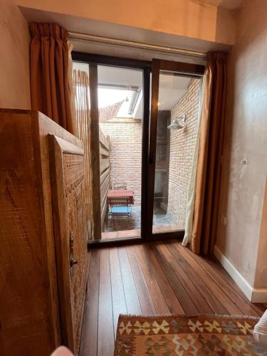 Ένα ή περισσότερα κρεβάτια σε δωμάτιο στο Boabdil Guesthouse
