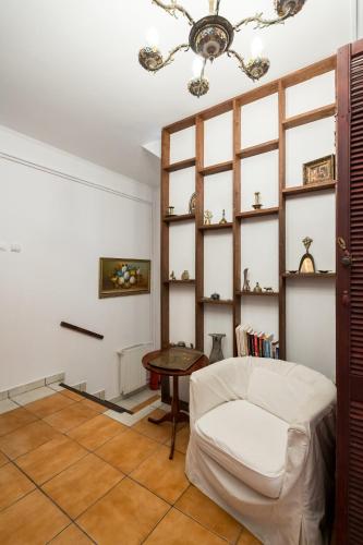 a living room with a couch and a table at Flower's in Bucharest