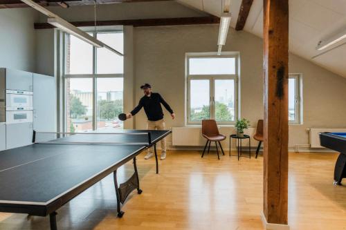 Stolní tenis v ubytování My Hostel Lidköping nebo okolí