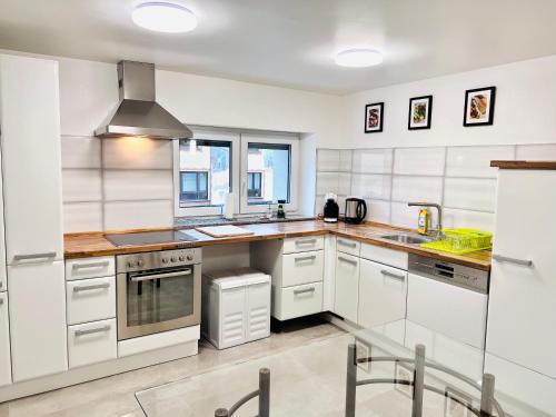 Kuchyň nebo kuchyňský kout v ubytování Corad2