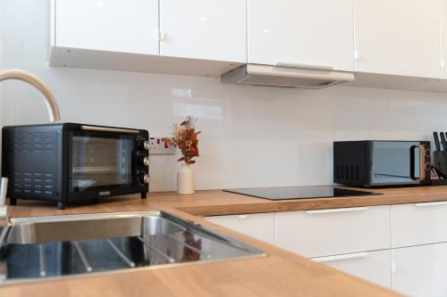Kuchyň nebo kuchyňský kout v ubytování Open Mind Property - Apartment with 2 Beds