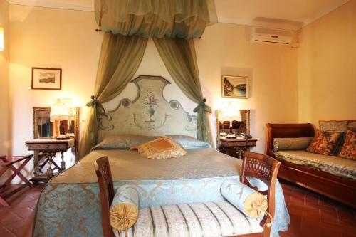Кровать или кровати в номере Resort e Spa San Crispino