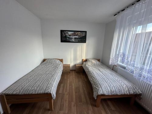 Postel nebo postele na pokoji v ubytování House Lucky