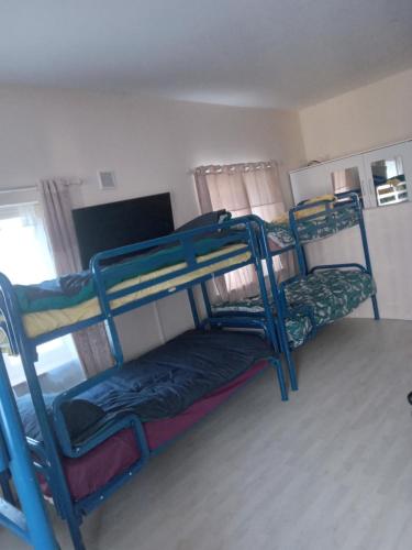 Postel nebo postele na pokoji v ubytování Gorteen lodge
