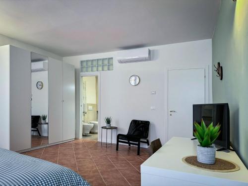 Postel nebo postele na pokoji v ubytování Residenza Gonzaga
