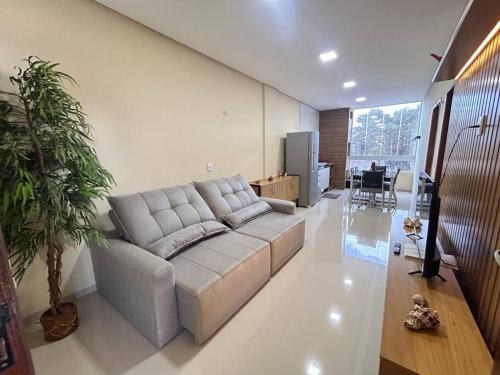 Χώρος καθιστικού στο Flat 2 Suítes, piscina e churrasqueira em Alter