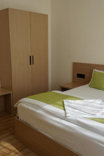 Postel nebo postele na pokoji v ubytování Dn hotel