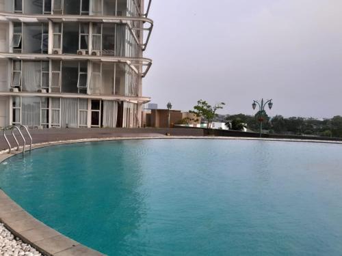 Kolam renang di atau dekat dengan Nature INN Majestic Point Serpong