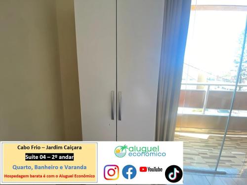 a white cabinet in a room with a window at Cabo Frio - Jardim Caiçara - Aluguel Econômico in Cabo Frio
