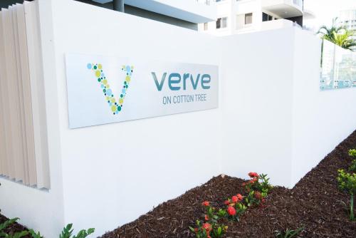 a sign that is on the side of a building at Verve on Cotton Tree in Maroochydore