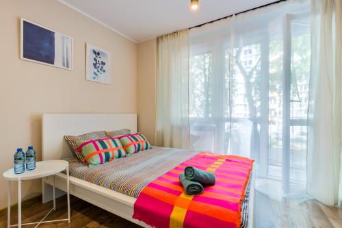 Katil atau katil-katil dalam bilik di Apart Rooms City Centr