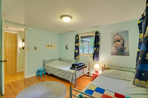 a bedroom with two beds and a window at Secluded Stroudsburg Home - 5 Mi to Ski Resort in Stroudsburg