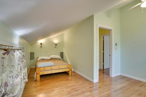 a bedroom with a bed in the middle of a room at Secluded Stroudsburg Home - 5 Mi to Ski Resort in Stroudsburg